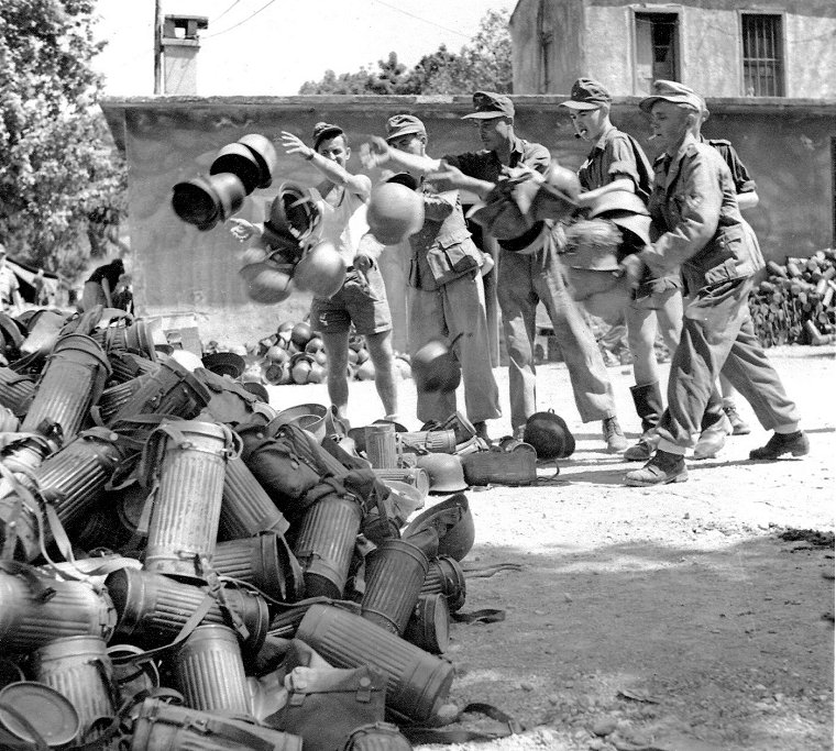 German troops dispose of containers