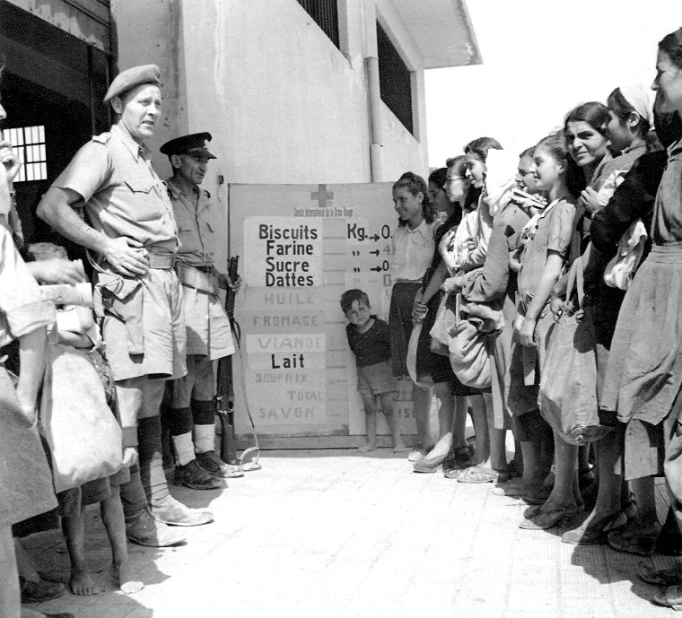 People queue for food